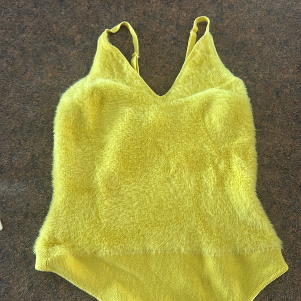 Beautiful free people intimated bodysuit. Super soft and cozy.